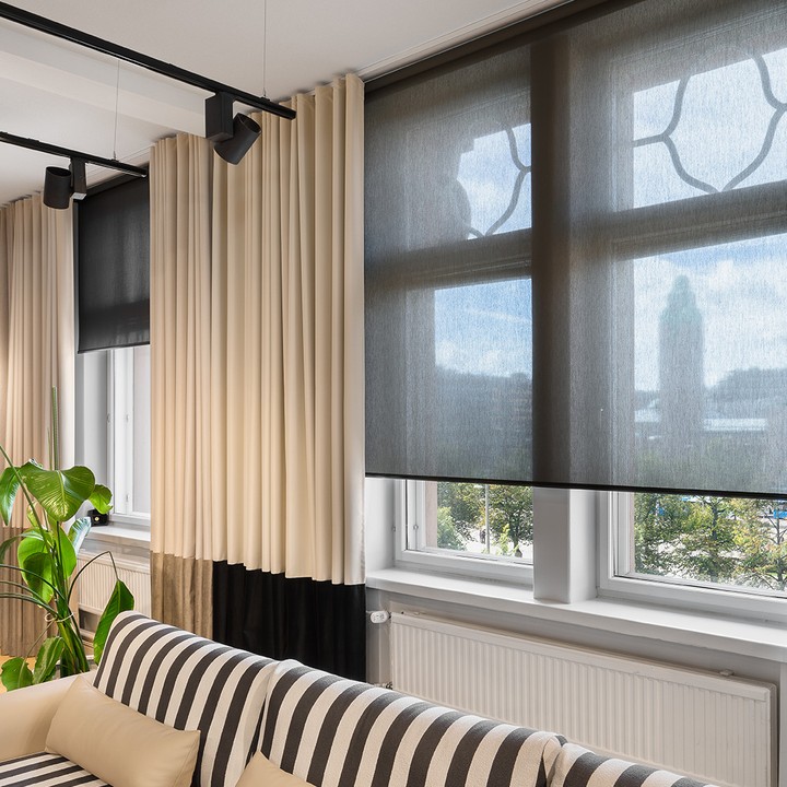 Auringonvalon hallintaa rullaverhojen avulla